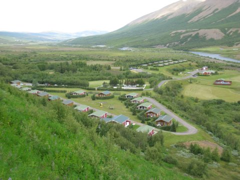 Húsbílar/ferðavagnar við bústaði í orlofshúsabyggðum